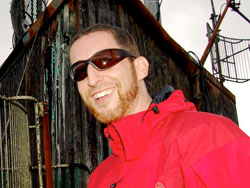 designer and draftsman jonathan jay atop Kahili Mountain.